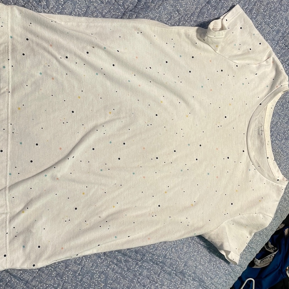 White poka dot shirt